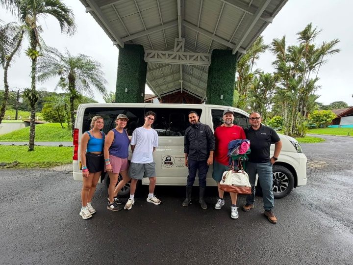 Eddie with happy clients next to the Travesía Costa Rica van